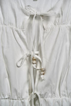 The Bead Peplum Top