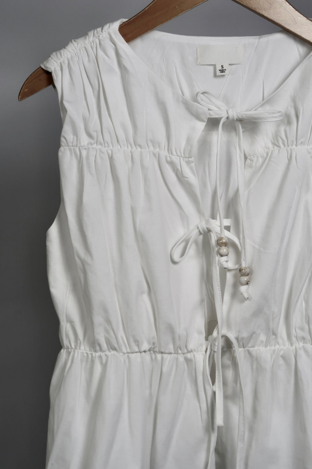 The Bead Peplum Top