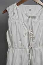 The Bead Peplum Top
