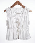 The Bead Peplum Top